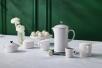 Le Creuset Mini Cocotte white mit weißem Geschirr Set
