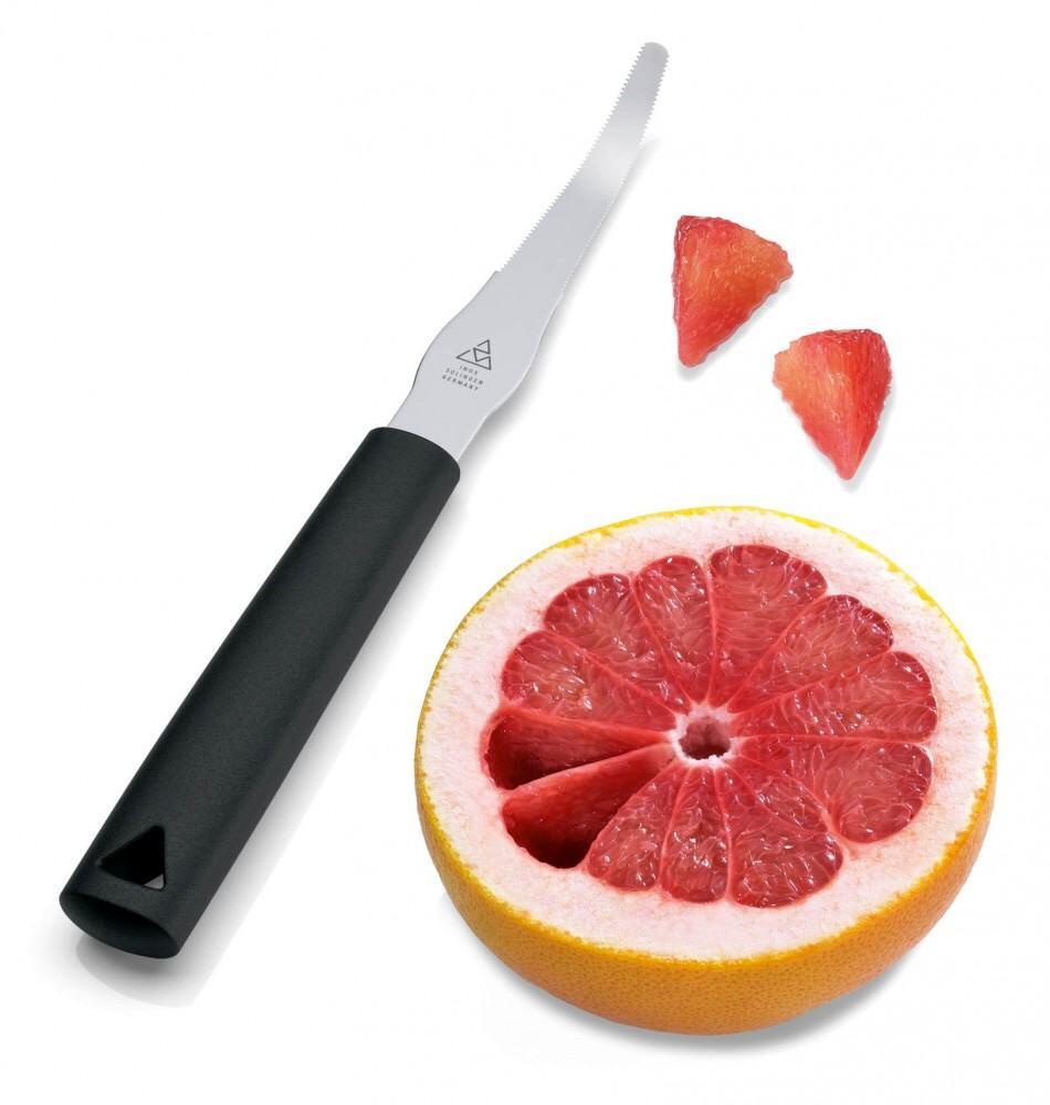 triangle Butterroller Spirit Messer neben Grapefruit und Erdbeeren